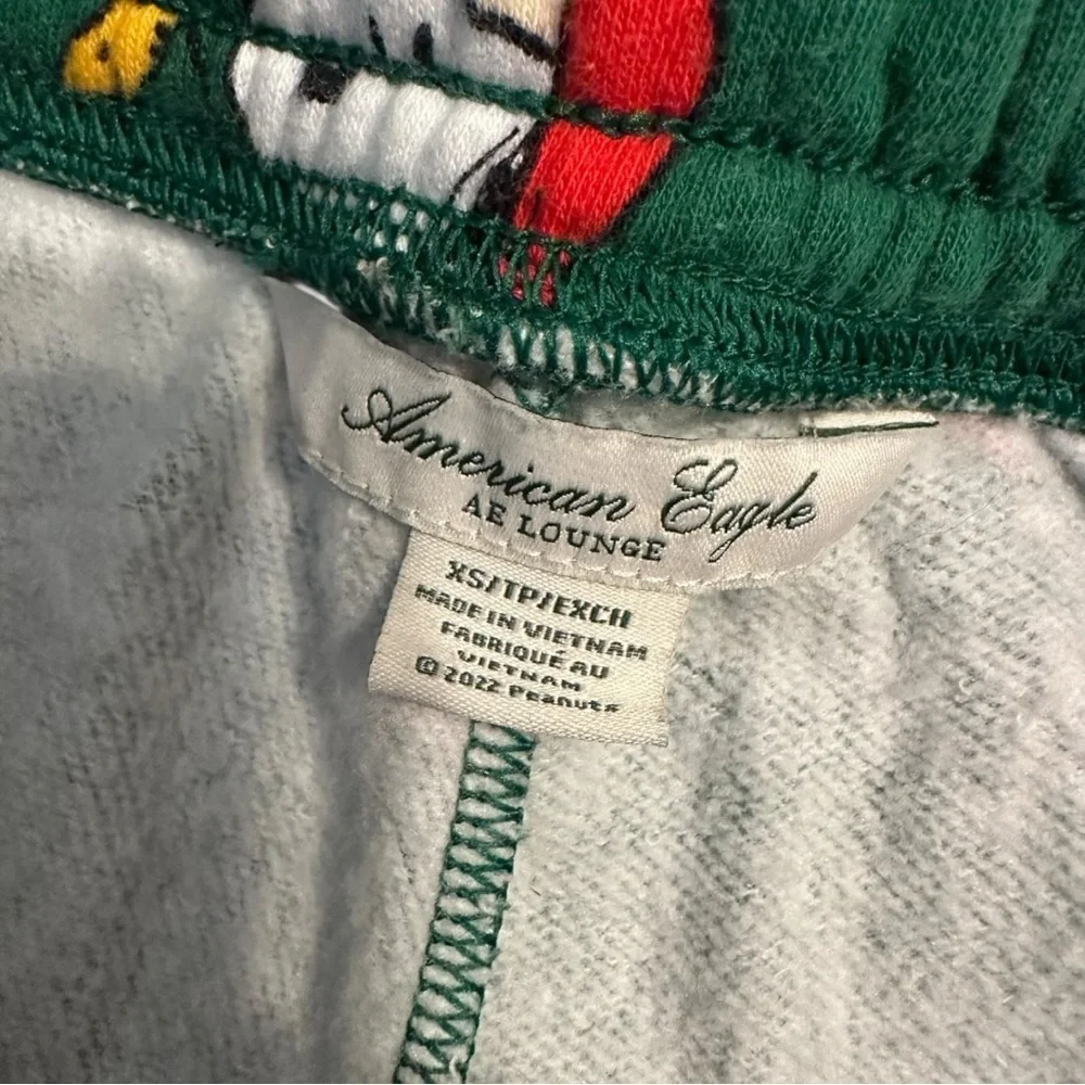American Eagle Lounge Snoopy Christmas Pajama Pants XS Green Holiday Peanuts